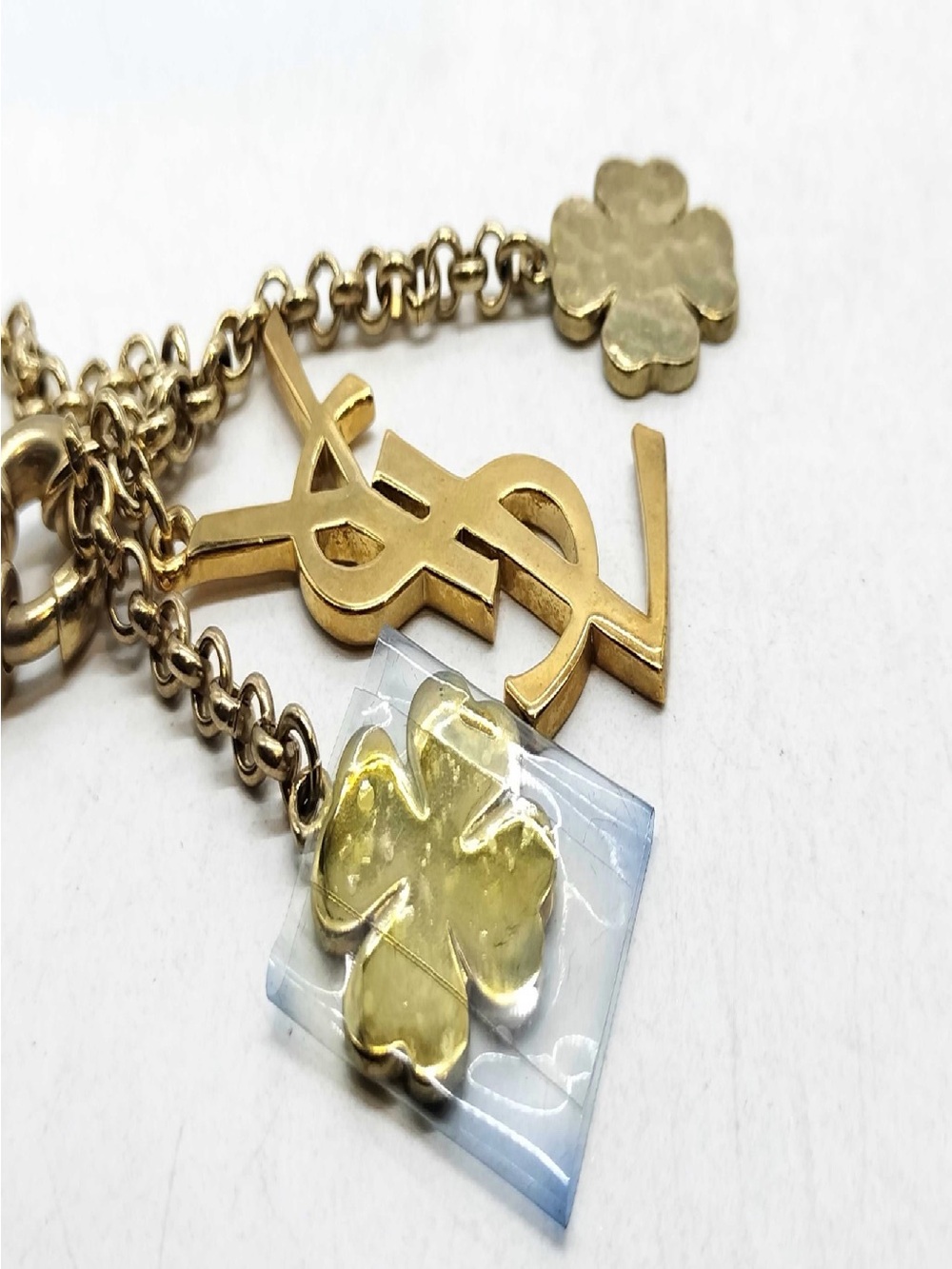 Yves Saint Laurent Gold-Tone YSL Logo and Clover Charm Bracelet - Picture 2 of 6